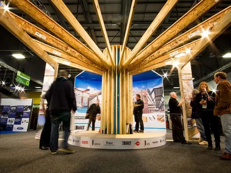 Engineered timber beams fanning out from a central column on the NZWood and iBuilt stand