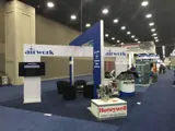 Exhibition booth with portal frame and engine plinth