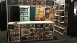 Food exhibition stand with chiller and shelving tower