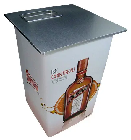 Cointreau bar table with a brushed metal top, recessed well and orange bottle graphics