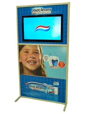 Macleans Advanced frame with a screen at eye level above printed product panels