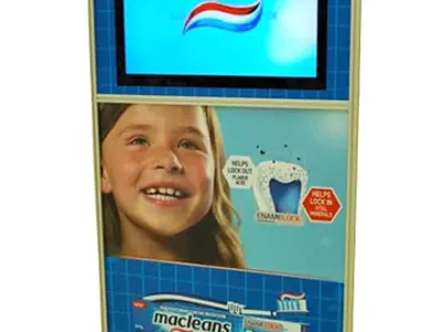 Macleans Advanced frame with a screen at eye level above printed product panels