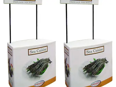Two Sea Cuisine demo counters printed with prawn photos under raised 'Indulge yourself' headers