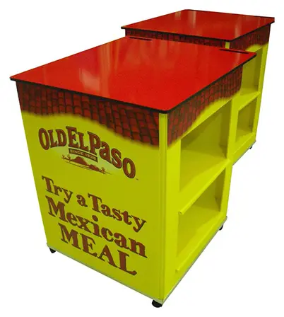 Two yellow Old El Paso carts with red tops and open back shelves