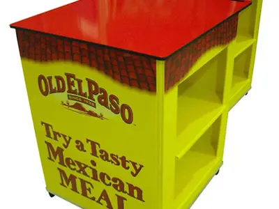 Two yellow Old El Paso carts with red tops and open back shelves