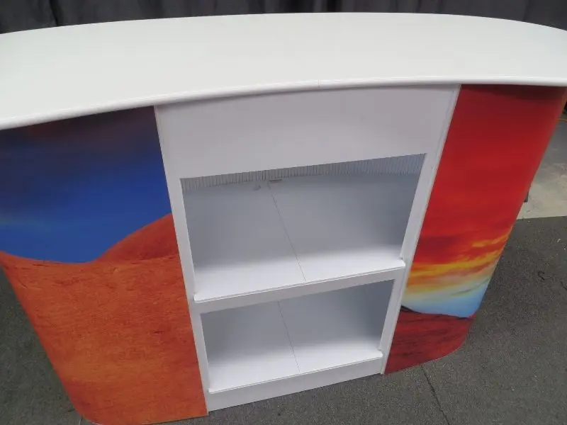Extra shelves fitted inside a pop-up demonstration table