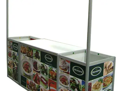 Delmaine portable bar covered in food photos, with a header frame and long central worktop