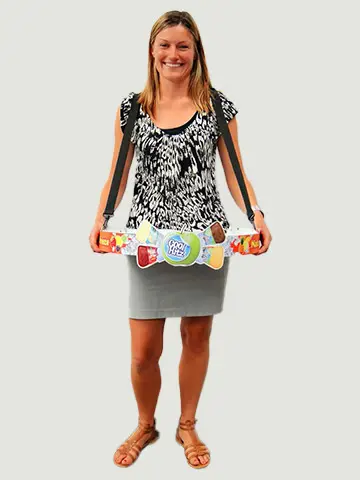 Promoter wearing a narrow Cool Hitz ice cream tray at the waist on shoulder straps