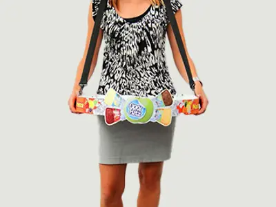 Promoter wearing a narrow Cool Hitz ice cream tray at the waist on shoulder straps