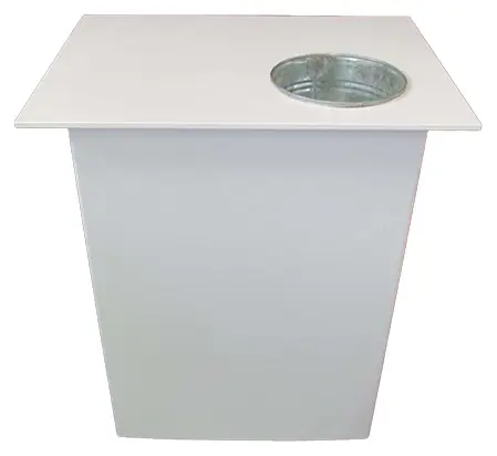 Plain white demo table with a metal bucket set into its top