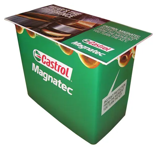 Green Castrol Magnatec demo counter with engine imagery printed across the top