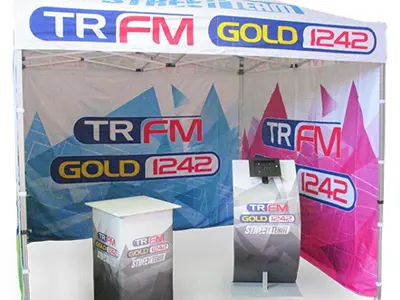 TRFM and Gold 1242 gazebo with a printed staff counter and a curved tablet stand