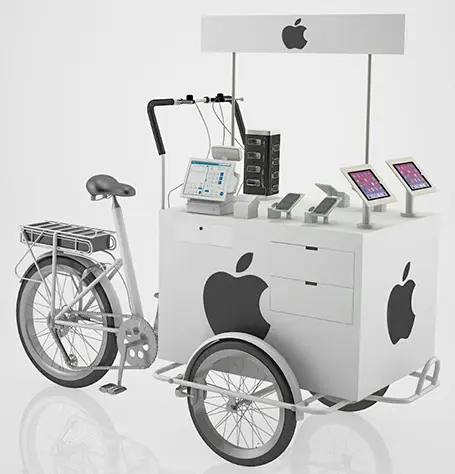 Concept design of a tricycle vendor cart with Apple branding, device stands and drawers