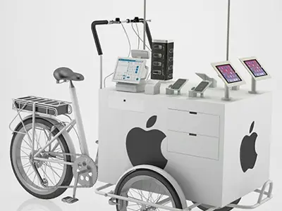 Concept design of a tricycle vendor cart with Apple branding, device stands and drawers