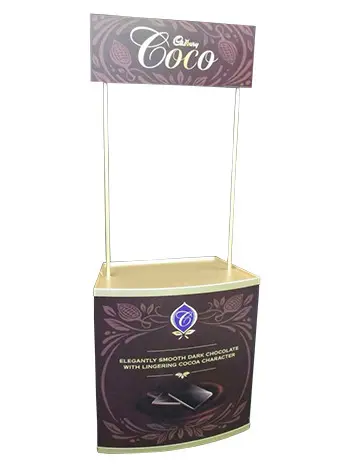 Cadbury Coco tasting table with dark chocolate artwork and a Coco header on two poles