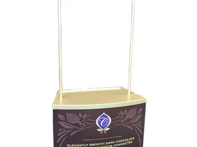 Cadbury Coco tasting table with dark chocolate artwork and a Coco header on two poles