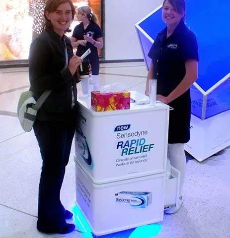 Two stacked Sensodyne Rapid Relief modules holding tissues and samples above a blue-lit base