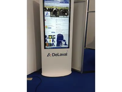 Portable digital kiosk running advertisements from the corner of a stand