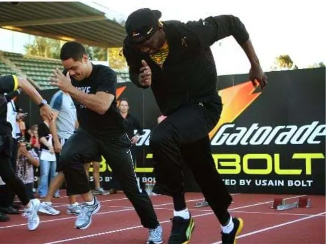 Gatorade Bolt banner wall behind the start line of a running track