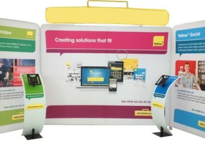 Walls in three sections and combined with header graphic and iPad stands