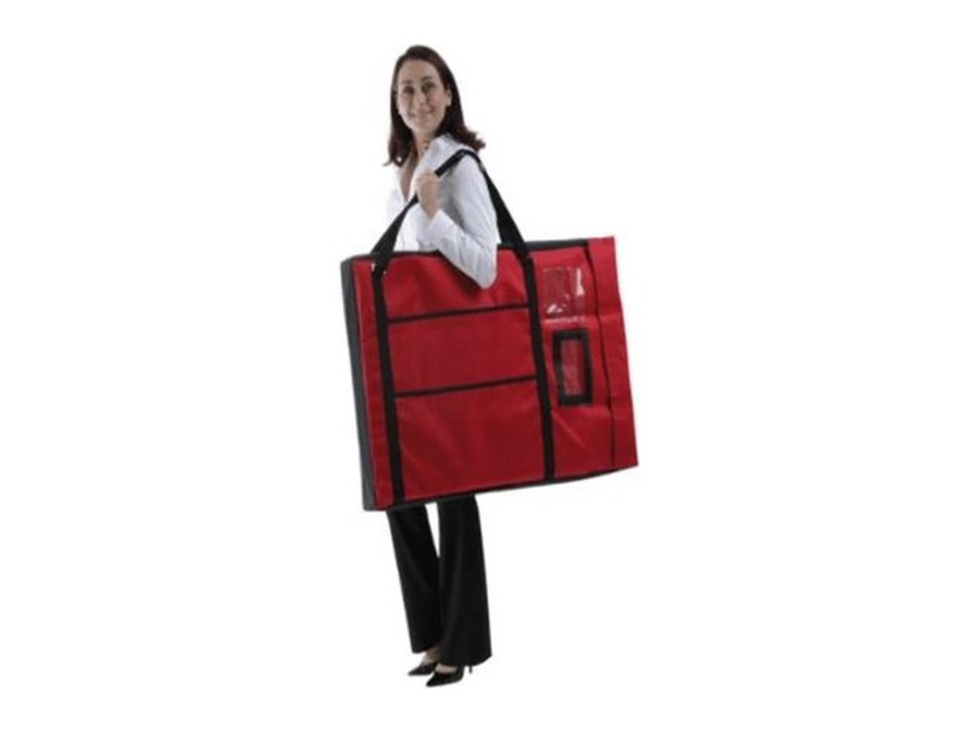 Woman carrying a flat red padded carry bag holding folded portable plinths