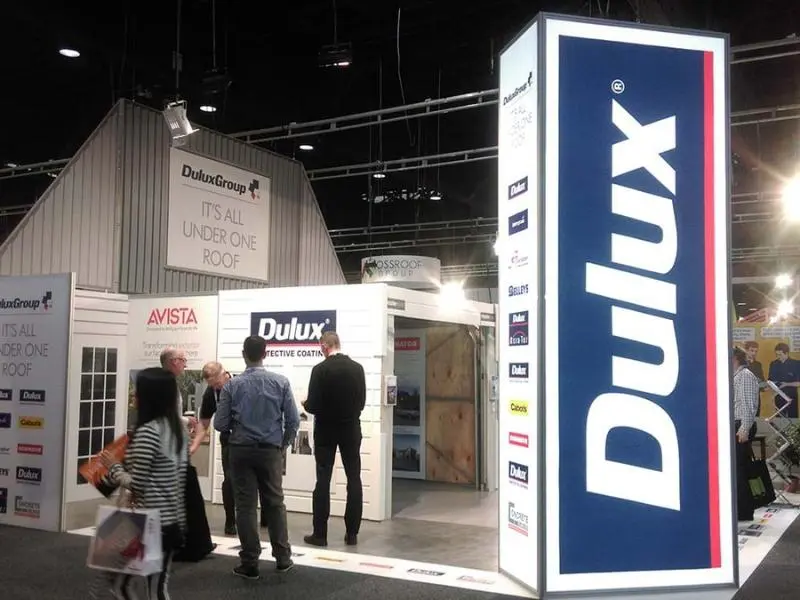 Illuminated Dulux tower on the corner of a house-style DuluxGroup exhibition stand