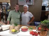 Cooking demonstration counter with a clear screen in-store