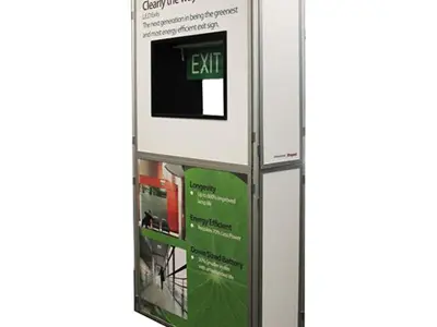 Working LED EXIT sign set into a printed tower with an energy-efficient message