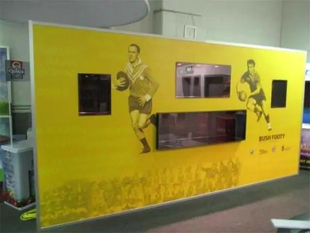 Yellow NRL Bush Footy wall with vintage player images and recessed openings