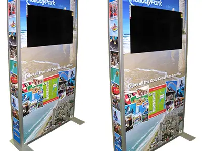 Two Gold Coast Holiday Park towers with landscape screens above holiday photos