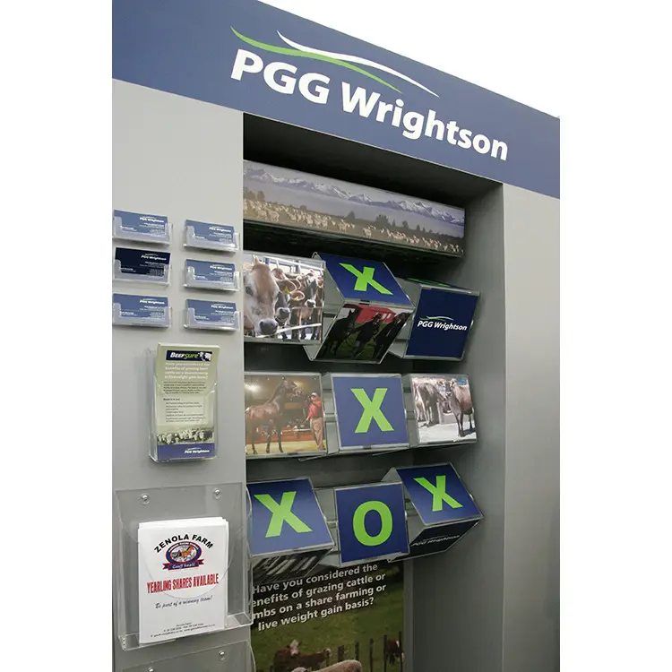 PGG Wrightson brochure panel under a blue header with card holders and angled rural photos
