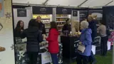 Sampling stands for cheese and ice cream in a marquee