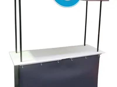 Counter with a Sales Central valance on four poles above a broad white top