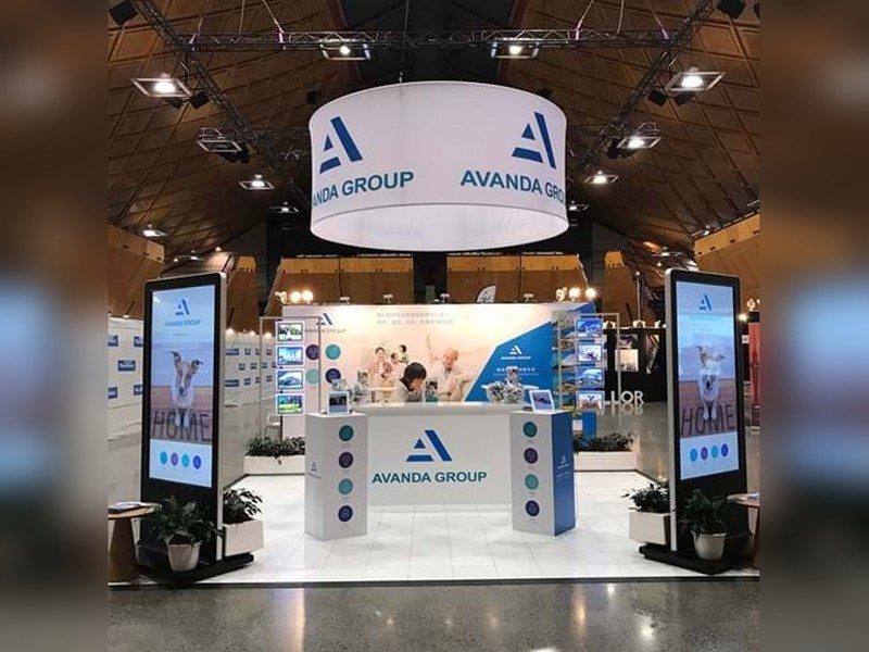 expo stand with sky banner