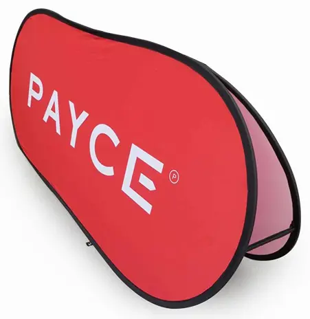 Red PAYCE pop-up A-frame banner standing low on its own flexible frame
