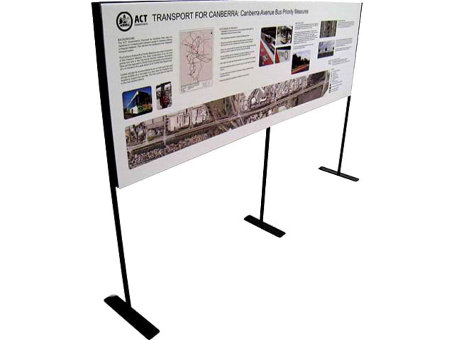ACT Government information board on Transport for Canberra's Canberra Avenue bus priority measures, printed and mounted on freestanding posts with floor feet