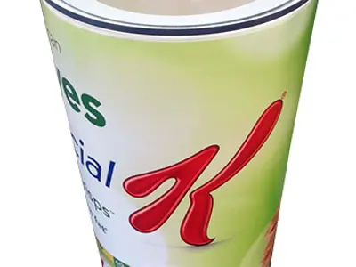 Special K cylinder sampling bin with a red K wrap and a clear handled lid