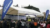 Field day flags at each end of a long marquee