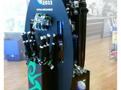 Rugby World Cup 2011 stand shaped like a ball, hung with umbrellas and lanyards