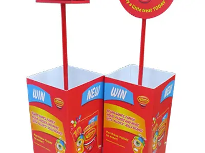 Allen's lolly bins on castors with a round pole sign and a box header