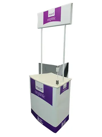 Macro Organic sampling counter with a purple header and two clear upright panels