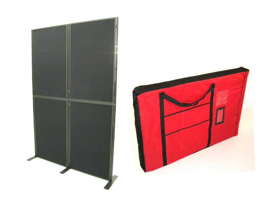 Four dark grey display panels joined in a two-by-two wall on metal feet, beside a red padded carry bag with handles