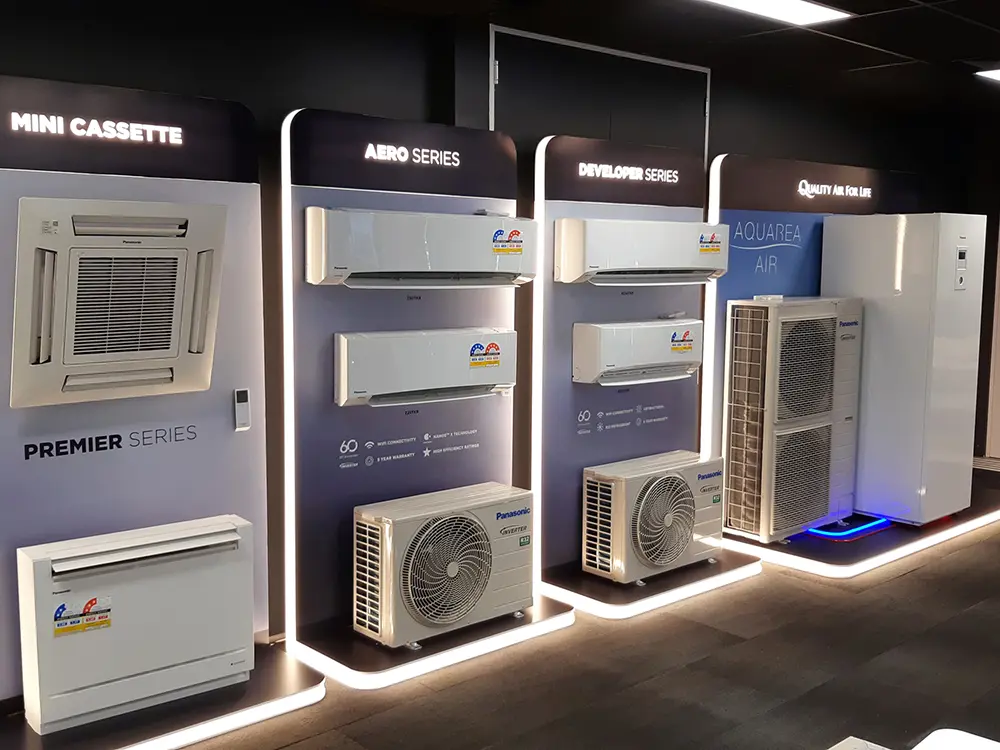 Panasonic air conditioners mounted on dark panels outlined in LED edge lighting