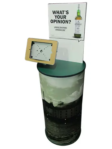 Round Laphroaig tasting plinth with a tablet holder and What's your opinion? card