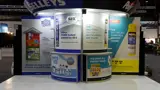 Custom expo display with curved header sign at an exhibition