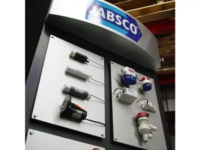 Jabsco tower with bilge pumps, switches and fittings on aluminium panels below a curved header