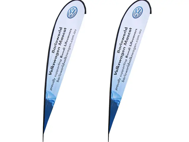 Matching Barloworld Volkswagen Mascot flags with a VW logo and blue wave supporting Bondi Lifesavers
