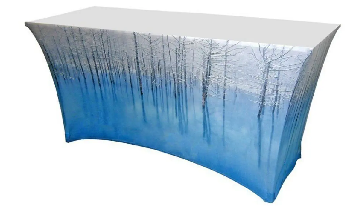 How do I put on a stretch table cover without wrinkles?