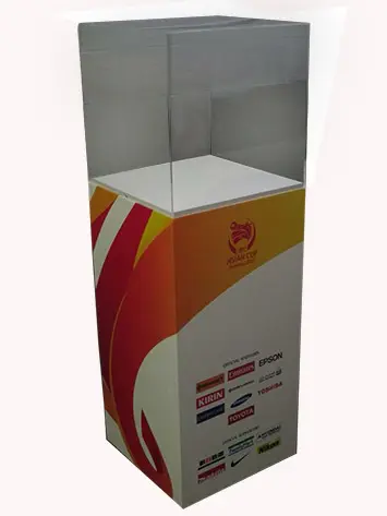 AFC Asian Cup plinth in red, orange and yellow sponsor artwork under a clear case