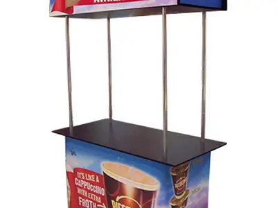 Riccocino pod with an I'm free today panel and cup graphics on the counter